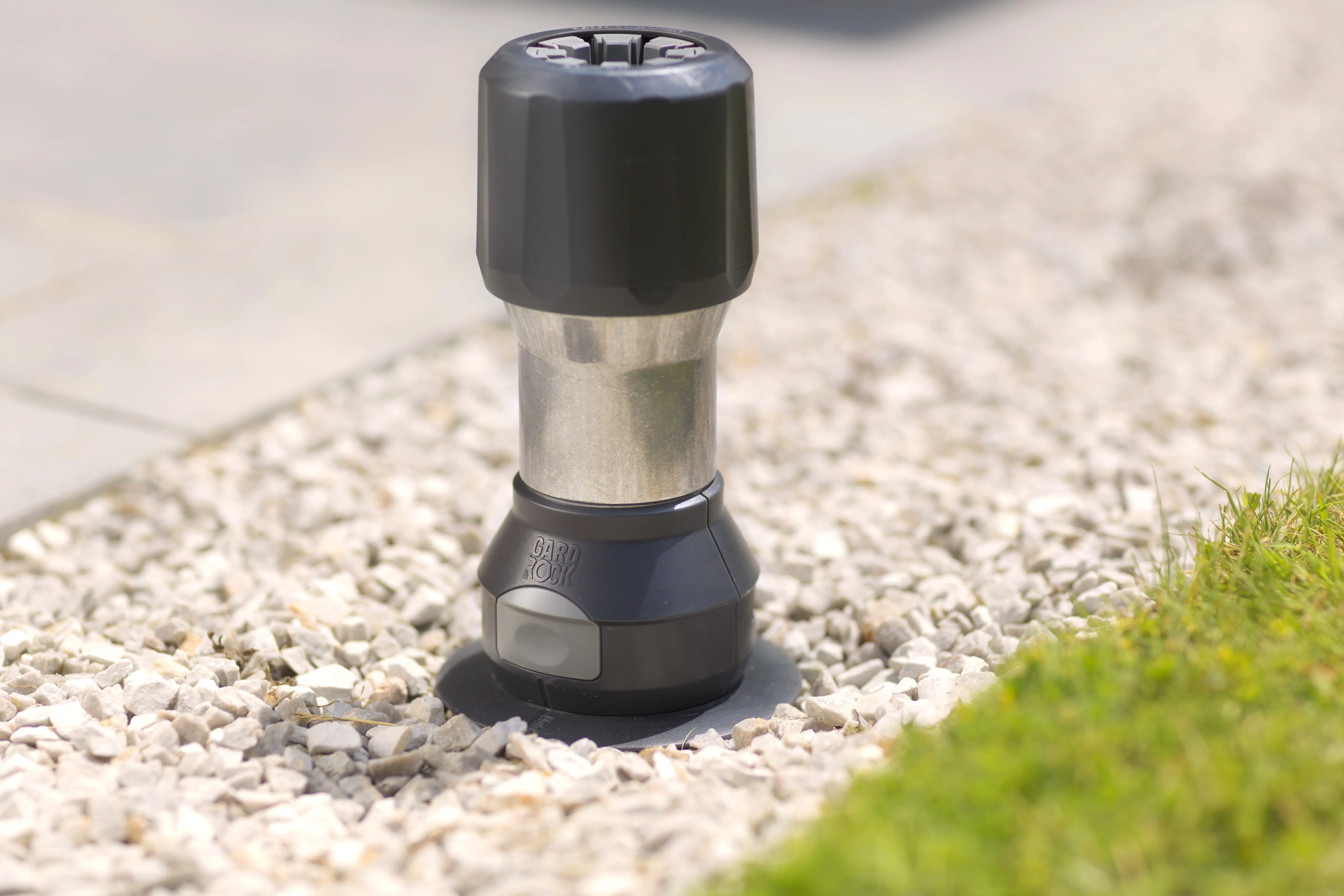 Discreet parasol base that clips in and out easily