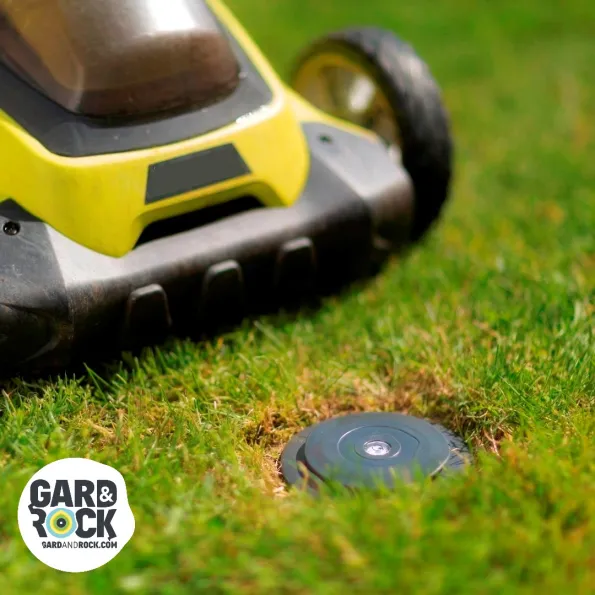 Ground-level anchor base, no obstruction for lawn mower passage