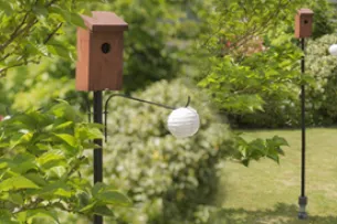 Fixing for bird feeder and removable garden poles